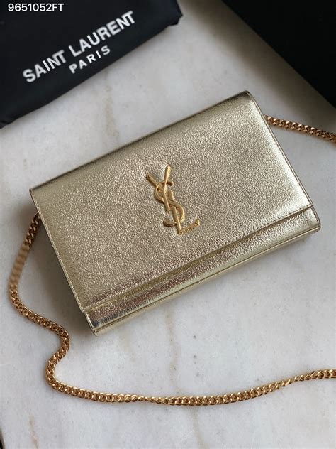 ysl gold purse